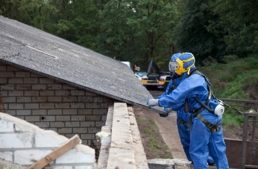 Men working outside in asbestos PPE